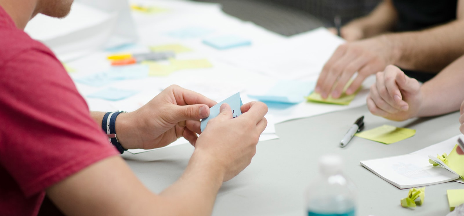 Content Marketing Team Using Post-It Notes